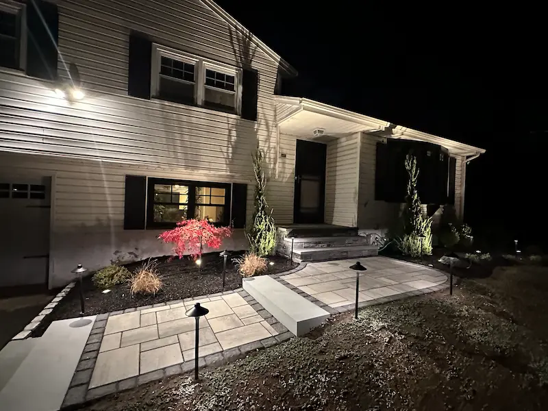 Wyckoff NJ paver walkway with landscape lighting.